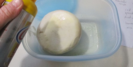 spray dough  ball with cooking spray. Close lid.