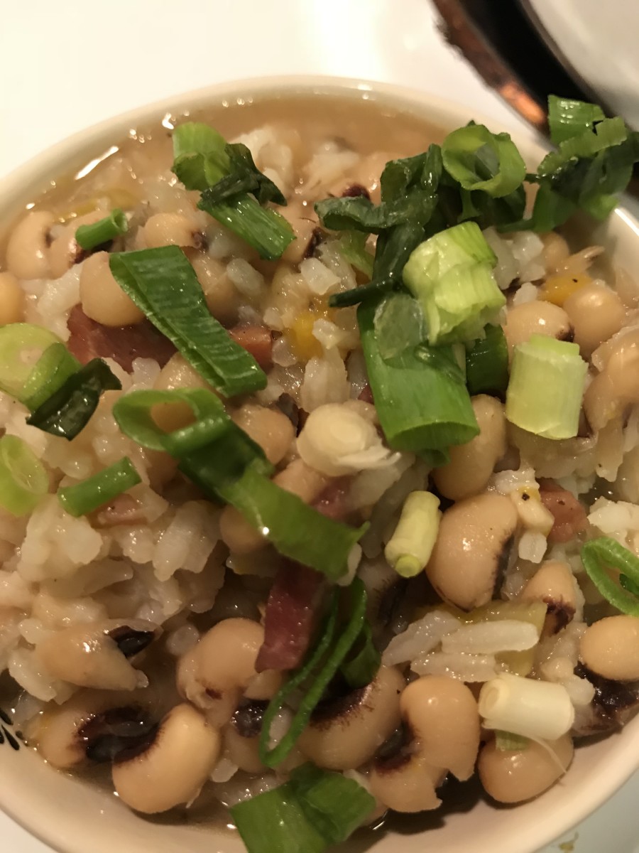 Top your Hoppin John with a little diced green onion and it's ready to serve. This dish stores well in the fridge and is just as good hot or cold.