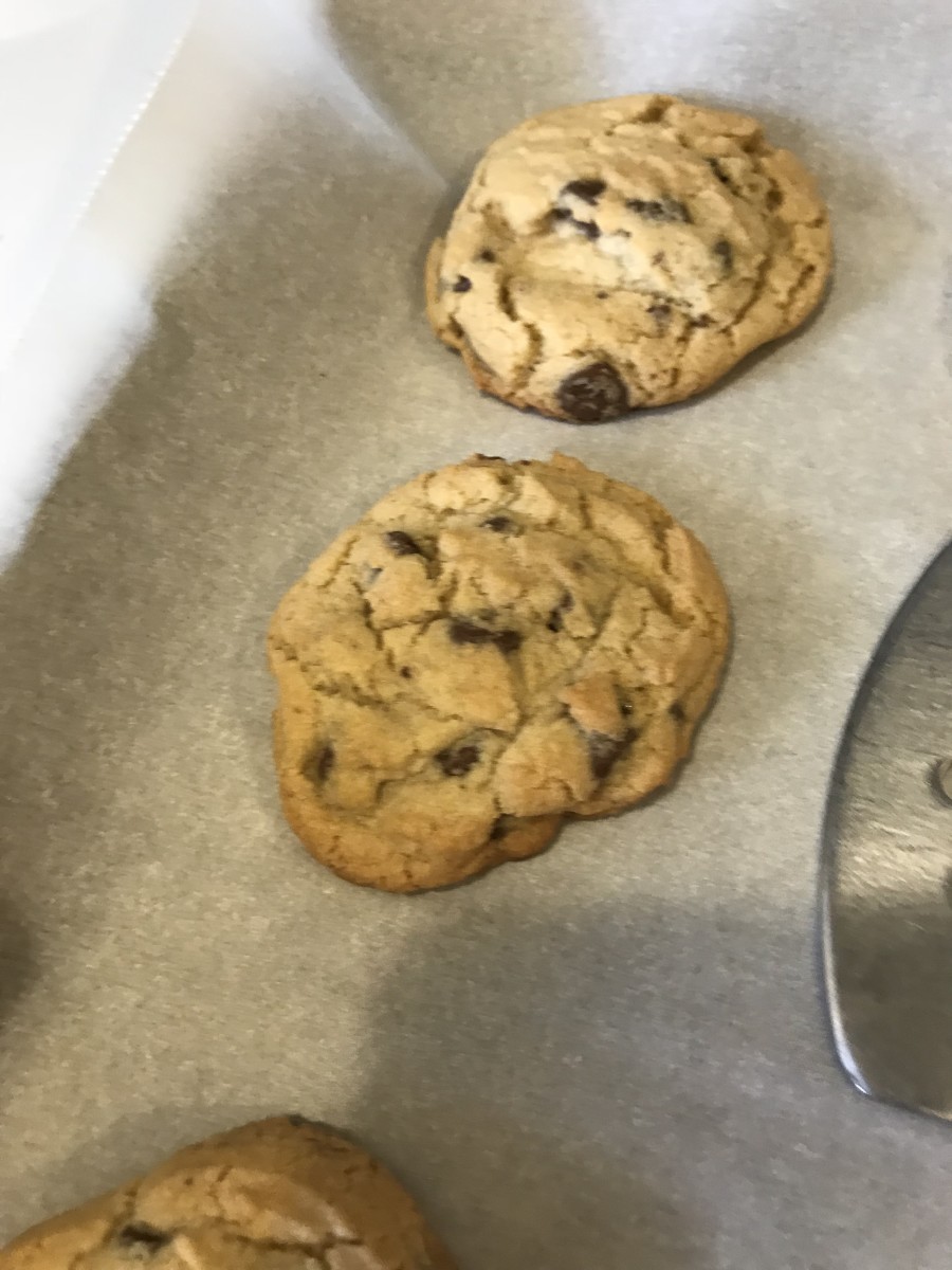Give the cookies about 30 seconds to rest before moving them. This lets them set, and they'll be much easier to move intact. Once set, transfer them to a wire baking rack to cool completely.
