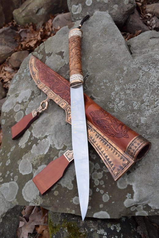 Replica Viking dagger and sheath made in traditional style, for attachment to a waist belt (see loops facing downward)