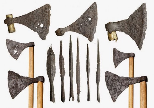A selection of axes and spearheads - only the wooden axe shafts are not original, having rotted down the centuries