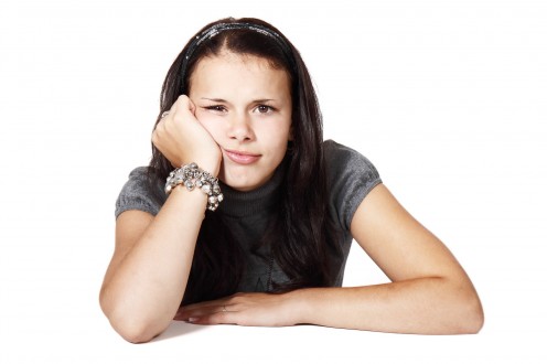 This girl is thinking about what to do. 