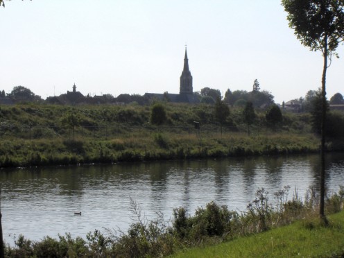 Bousbecque and Eglise Saint Martin, as seen from the Belgian side of the Lys/Leie river. Nord, Nord-Pas-de-Calais, France.