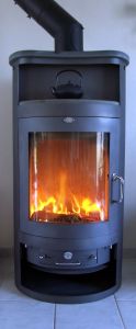 Fireplaces tend to be efficient in short uses for relatively small areas (or very small houses), unless plumbed into the entire HVAC system of the house.