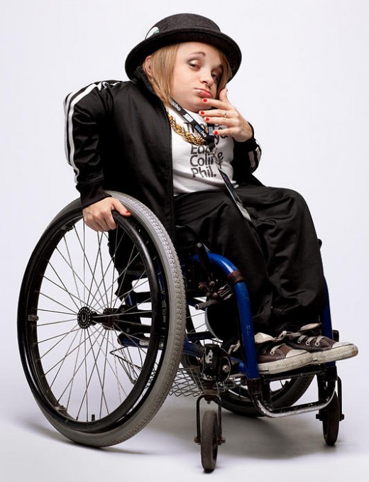42-inch tall Kalyn Heffernan was born with brittle bone disease. She is the emcee and public face of Denver’s Wheelchair Sports Camp, a renowned hip-hop group.