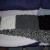 Black, white, and Lion Brand Country grey/white chunky yarns in a scarf for Special Olympics Wyoming 2018 games. Black, white, and Lion Brand Country grey/white chunky yarns in a scarf for Special Olympics Wyoming 2018 games.