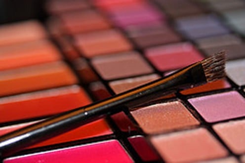 Buy a kit with lip colors, eye shadows and blush to compliment your skin tone, eyes and hair.