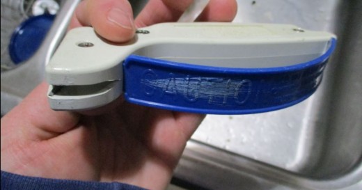 This is a different brand of sharpener. Those scratches are from the knife blade. Good thing there is a guard or there would be less fingers.