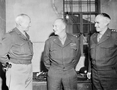 Gen. Dwight D Eisenhower, Supreme Commander-in-Chief, Allied Expeditionary Forces, Lieut. Gen. Omar N Bradley, Commanding Gen. of the 12th US Army Group, and Lieut. Gen. George S Patton, Commanding Gen. of the 3rd US Army