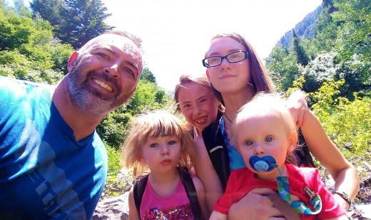 My family soaking up UV rays so our bodies can synthesize Vitamin D to help keep us healthy.