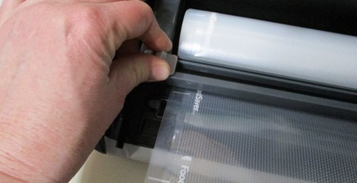It slides all the way to the other end of your bag to ensure a straight edge