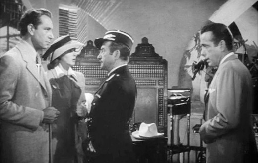 Left to Right Victor (Paul Henreid), Ilsa (Ingrid Bergman), Captain Renault (Claude Rains), and Rick (Humphrey Bogart)