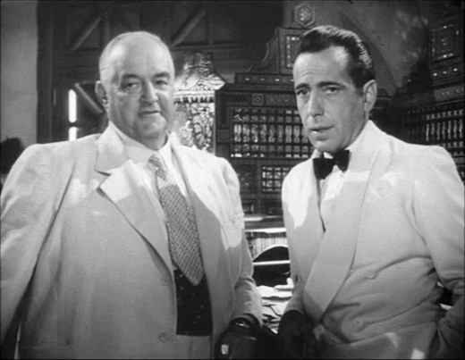 Ferrari (Sydney Greenstreet) and Rick (Humphrey Bogart) 