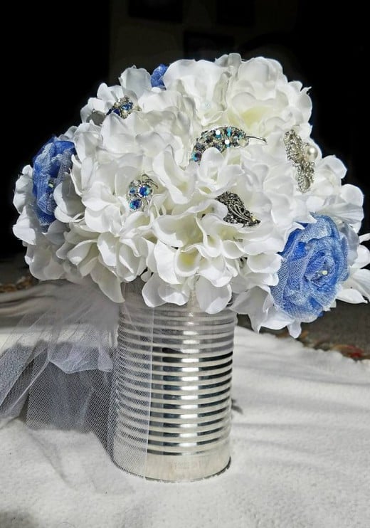 Bridal Bouquet with brooches from secondhand shops; reused coffee can for the holder.