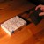 The carbon paper goes between the sketch and the wood. The carbon paper goes between the sketch and the wood.