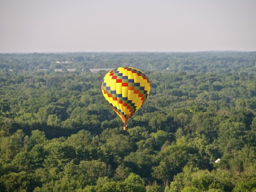 Hot air balloon in flight during Hot Air Jubilee over Jackson