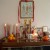 This picture was taken at a Malaysian Chinese home. This altar is dedicated to the three Pure Land sages. On the left of the altar is a glass filled with rice. Joss sticks are stuck into it after the ancestors are offered food. This picture was taken at a Malaysian Chinese home. This altar is dedicated to the three Pure Land sages. On the left of the altar is a glass filled with rice. Joss sticks are stuck into it after the ancestors are offered food.