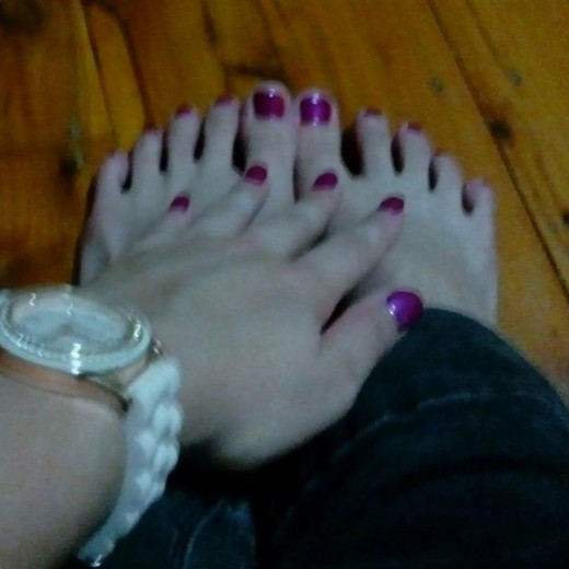 Manicure and pedicure with polish. 