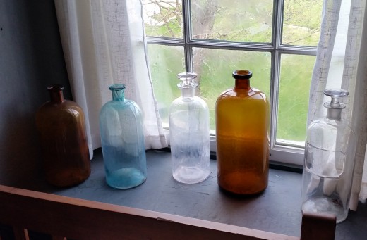 Bottles on the windowsill at a Shaker Village.