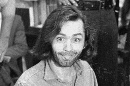 Charles Manson playing to the camera