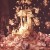 Scene at the bottom of the Museum's Christmas tree, December 1983.  The tree and candles are artificial.  The ornaments and Nativity sculptures are real.