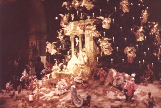 Scene at the bottom of the Museum's Christmas tree, December 1983.  The tree and candles are artificial.  The ornaments and Nativity sculptures are real.