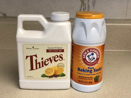 Young Living Thieves wash for fruits and vegetables, and Arm & Hammer baking soda 