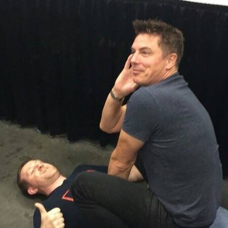 Comic Convention, John Borrowman (Top) straddles me (Bottom) for a picture.