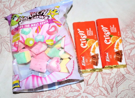Marshmallows, Orange flavoured Chocolate bars and Milk