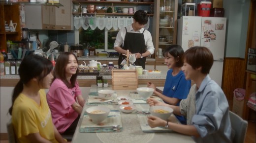 All the main characters are shown together in this one iconic dinner table scene in episode nine of "Your House Helper."