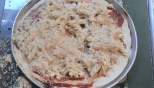 The pizza before going in the oven