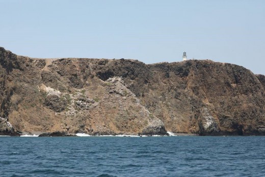 The backside of the East Island of Anacapa Island with the light house showing.
