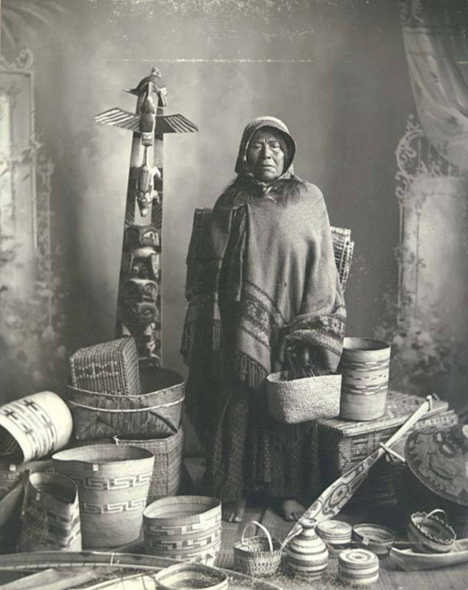 Salishan woman with basket and native art collection in Washington.