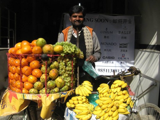 A fruit vendor offers fresh produce on the streets of Kathmandu. 