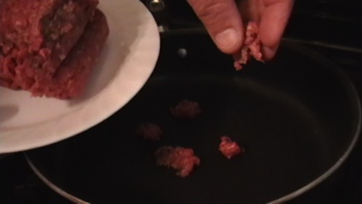 Browning the ground beef. Pinch by pinch.