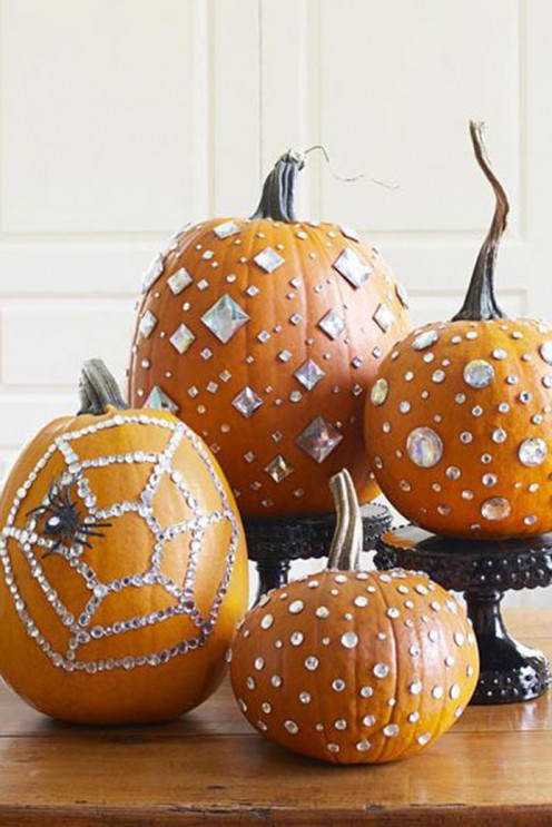 These chic pumpkins catch and reflect the flickers from eerie candlelight.