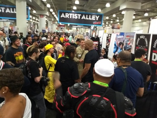 Darryl McDaniels, formerly of the hip hop group Run-DMC, drew a crowd in Artists' Alley, the area of the convention where individual artists promote their own artwork.