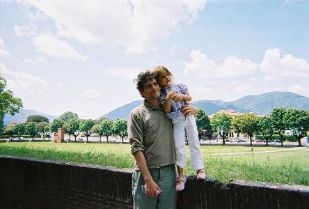 Little Princess and my other half on the Lucca walls with Tuscan mountains on the background