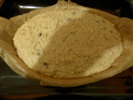 The mixture has been spooned into the dish, left to stand for a couple of minutes and is now ready for the oven.