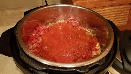 And finally add your tomato sauce.