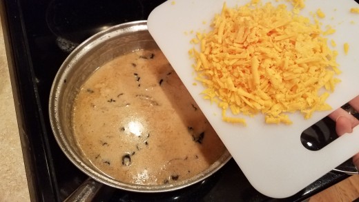 Now add your cheddar cheese to the cream of mushroom.