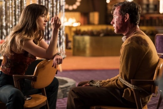 Dakota Johnson and Lewis Pullman as Emily Summerspring and Miles Miller in, "Bad Times at the El Royale."