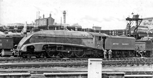 The 'World's Fastest Steam Locomotive' , 'Mallard' with a transitional number, at King's Cross in 1948