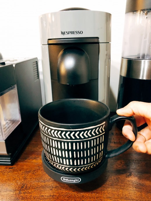 Place a cup or a mug of at least 27 fl oz. under the coffee outlet. 