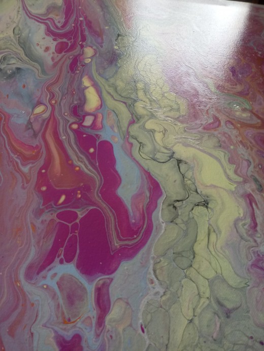 That reflection of light is the finish not the flash. Just enough shine to catch your attention but not enough to distract from the beauty of this canvas in all its pink glory