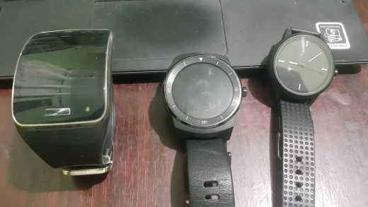 Samsung Gear 2, LG G Watch, and Lenovo Watch 9... Not included in the photo is the Xiaomi Amazfit 1