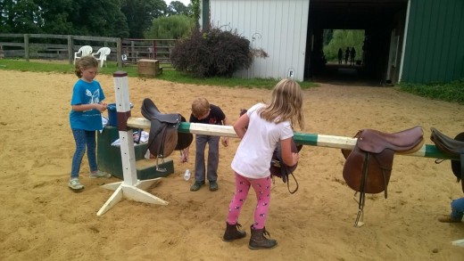 Clean tack or better yet, hold a kids day camp at the farm and let them clean it for you:-)