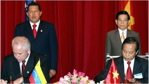 President Hugo Chavez and President Nguyen Minh Triet witnessed the signing of a petroleum cooperation agreement in Hanoi in 2006.