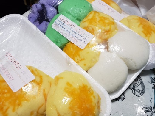 Assored puto - pandan flavor for green, yellow ones with cheese, ube makes it purple and white for the original color. 
