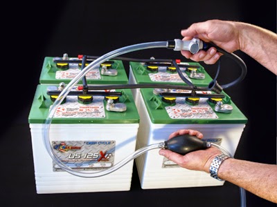 Battery watering system showing filler bulb